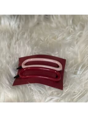 Pink Makeup Eraser hair clips. Brand new, never used. Unopened.